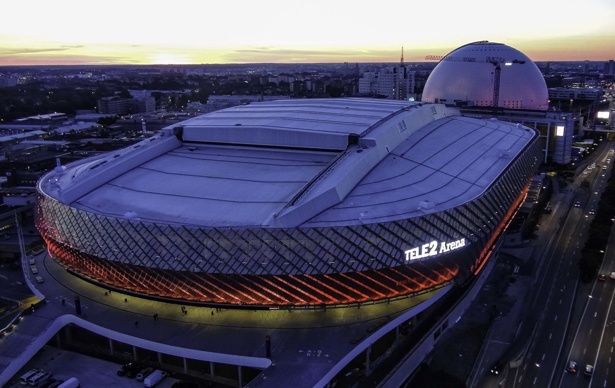 Overhead image of the Tele2 Arena at dusk with the lights on
