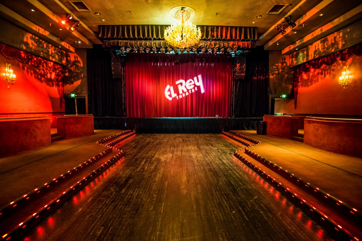 Dimly lit interior shot of El Rey and stage without guests