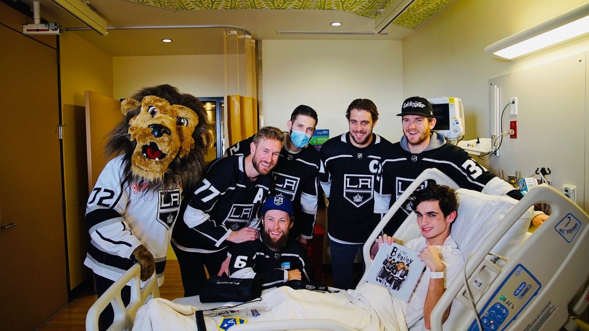 LA Kings players (from left to right) Jeff Carter, Jake Muzzin, Derek Forbort, Anze Kopitar and Jonathan Quick join Bailey in visiting patients during the annual LA Kings visit at Children’s Hospital Los Angeles on January 9, 2019.
