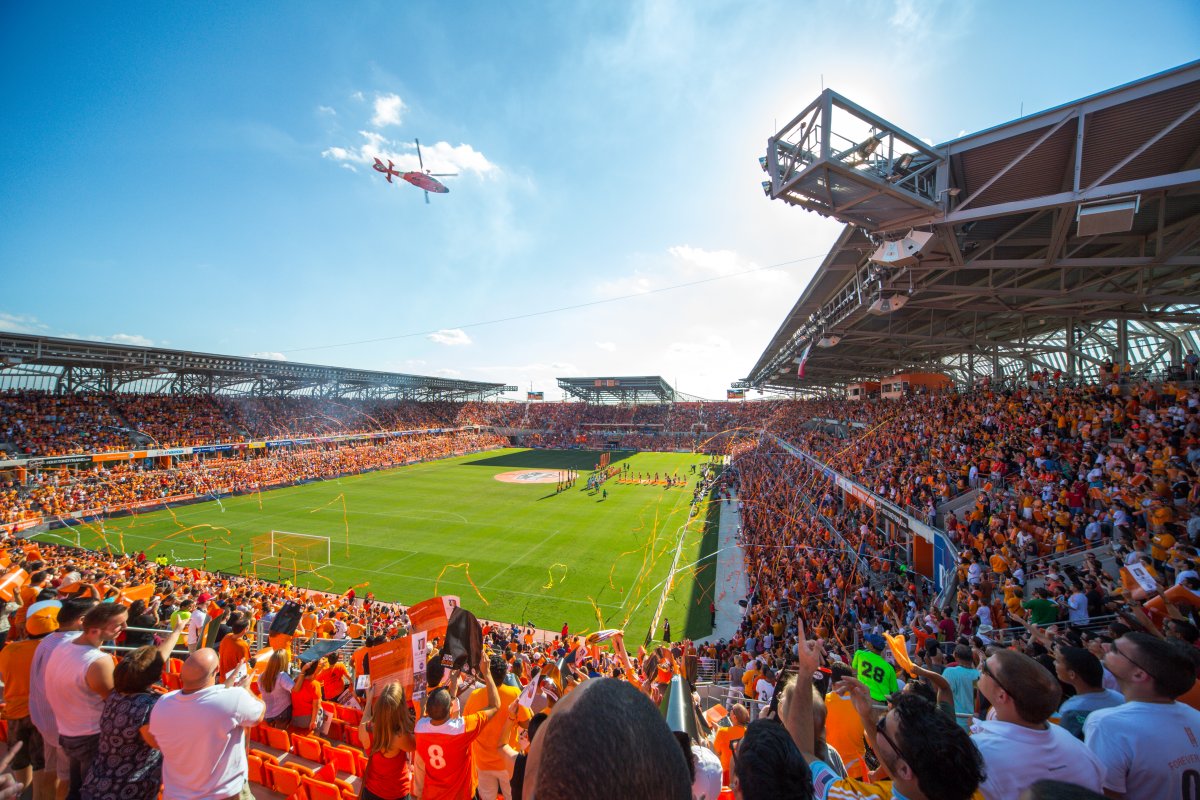Interior image of BBVA Stadium during a soccer game with the crowd cheering