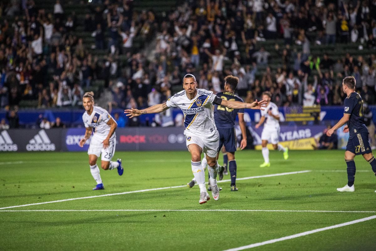 Galaxy soccer player celebrating on the field