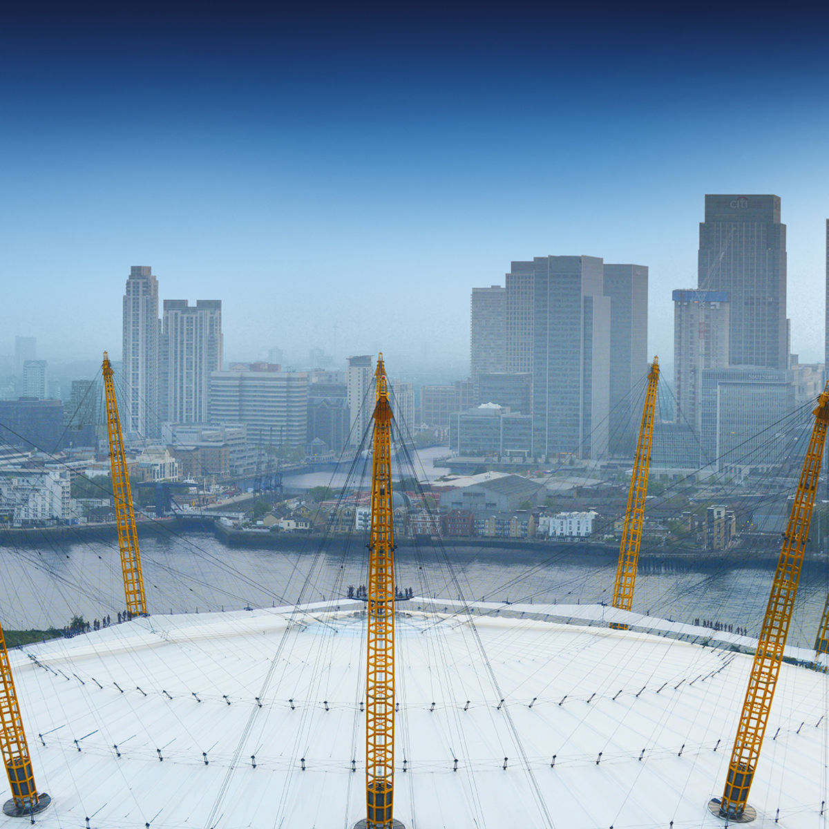 Aerial view above the O2 with city skyline