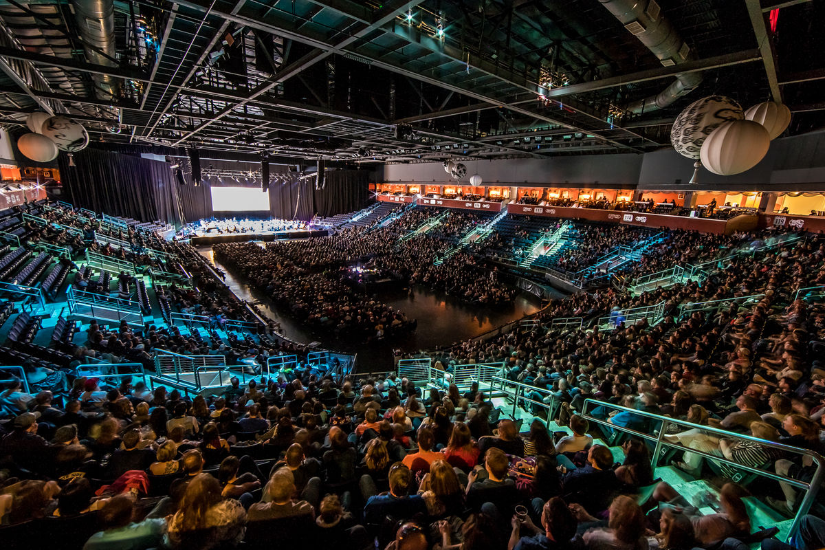 Interior shot of 1stBank Center with colored lanterns and no guests