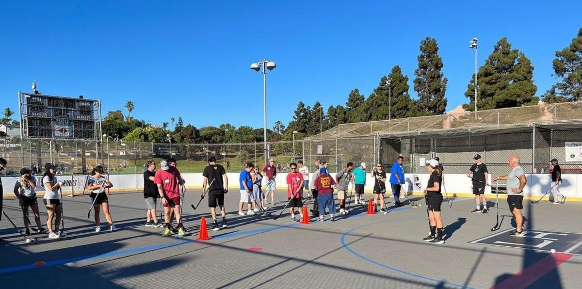 Special Olympics Southern California's floorball team participates in ball hockey drills led by the LA Kings Ice Crew.