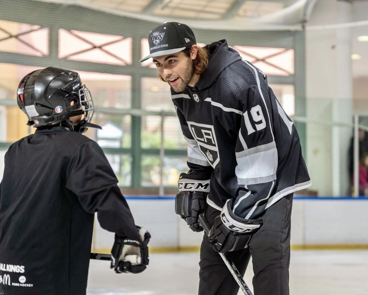 LA Kings Alex Iafallo talking with youth hockey player during We Are All Kings Rink Tour practice.