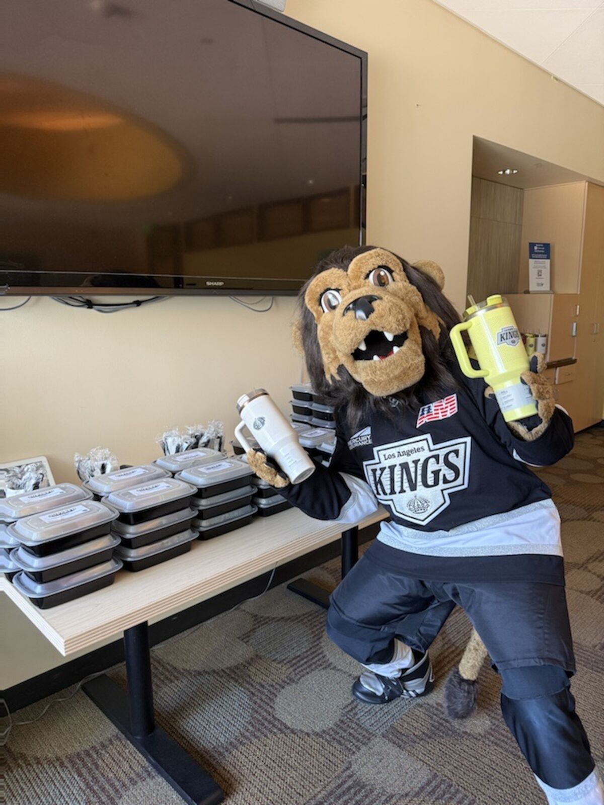 LA Kings Mascot Bailey in front of SuperFd lunches