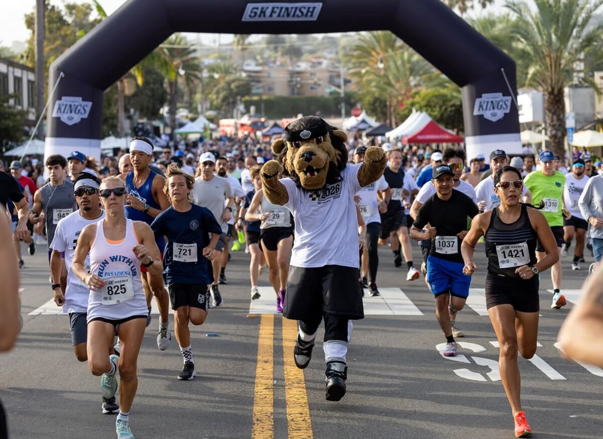 Bailey running with LA Kings 5K participants
