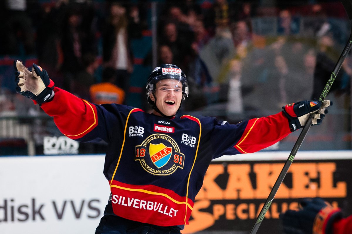 Djurgarden hockey player celebrating on the ice