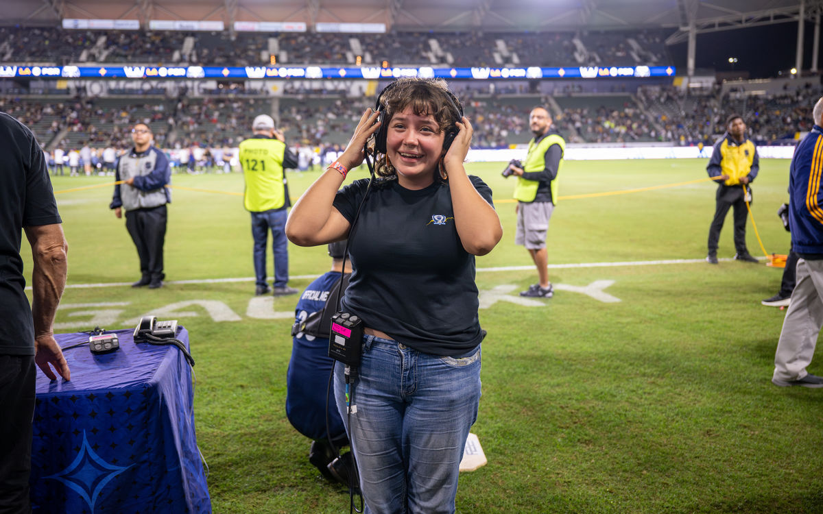 A student gets firsthand experience of game day operations at the LA Galaxy