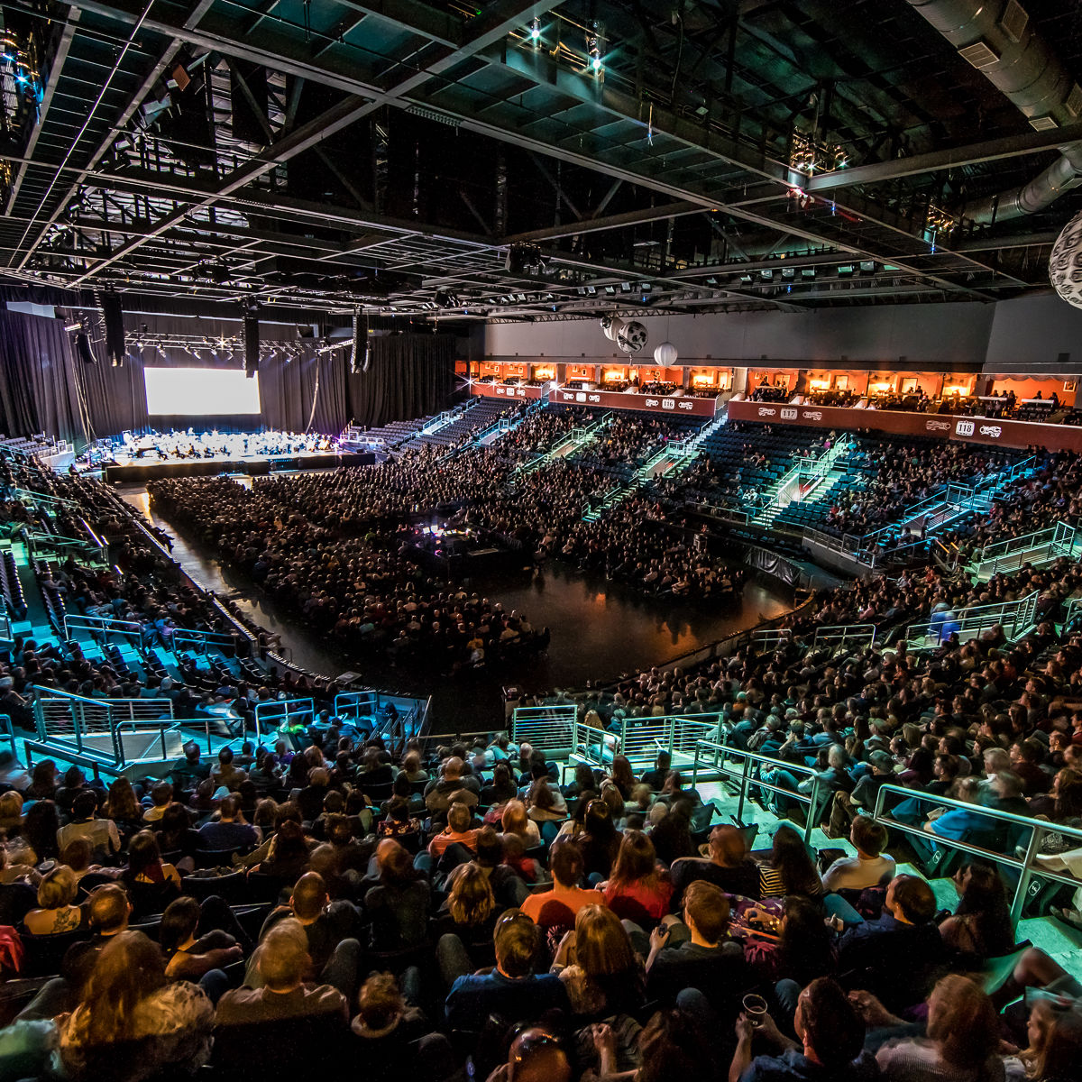 Interior shot of 1stBank Center with colored lanterns and no guests