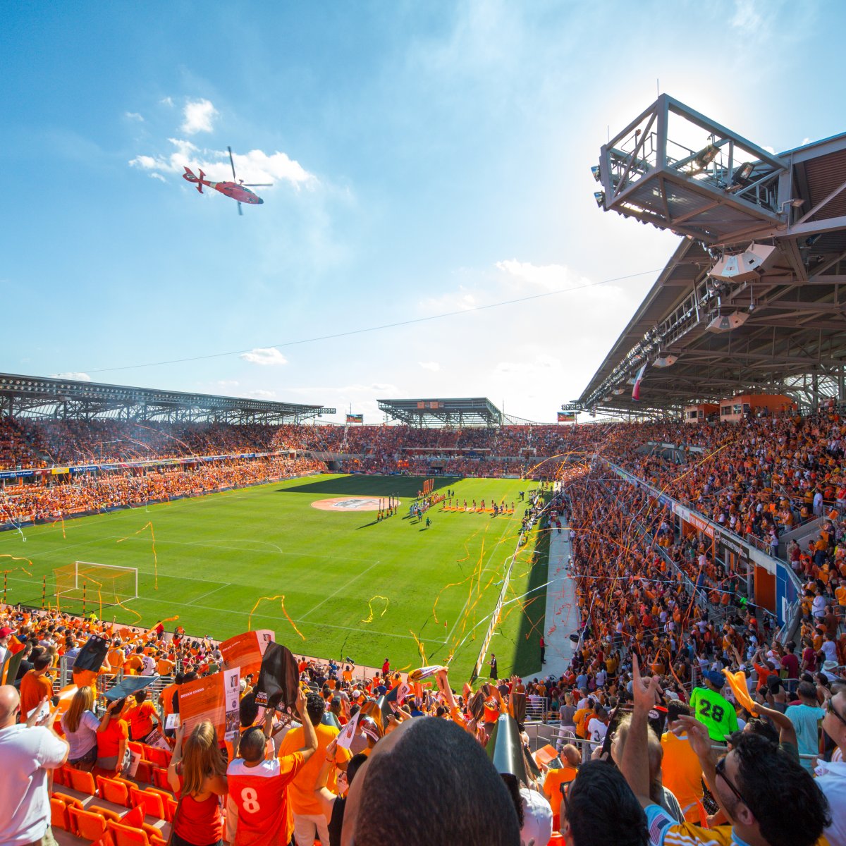 Interior image of BBVA Compass Stadium during a soccer game with the crowd cheering